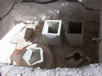 Clay blowing molds in kiln/annealer after 1450F firing.