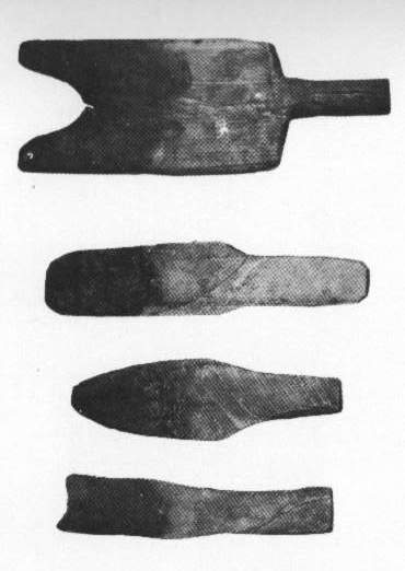 Samples of used wood paddles in Harvey Littleton's book
